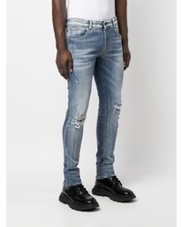 hellblaue enge Jeans mit Destroyed-Effekten von Salvatore Santoro