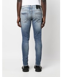 hellblaue enge Jeans mit Destroyed-Effekten von Salvatore Santoro