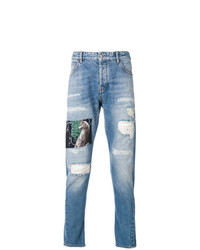 hellblaue enge Jeans mit Destroyed-Effekten von Marcelo Burlon County of Milan
