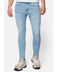 hellblaue enge Jeans mit Destroyed-Effekten von Mavi