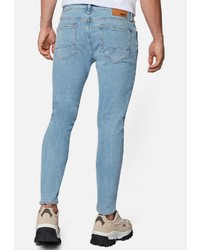 hellblaue enge Jeans mit Destroyed-Effekten von Mavi