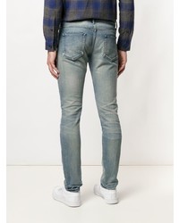 hellblaue enge Jeans mit Destroyed-Effekten von John Elliott