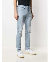 hellblaue enge Jeans mit Destroyed-Effekten von Neuw