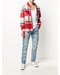 hellblaue enge Jeans mit Destroyed-Effekten von Philipp Plein