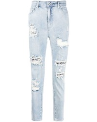 hellblaue enge Jeans mit Destroyed-Effekten von Musium Div.