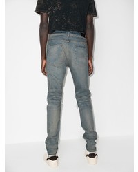 hellblaue enge Jeans mit Destroyed-Effekten von Amiri