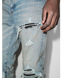 hellblaue enge Jeans mit Destroyed-Effekten von Amiri