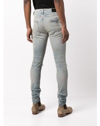 hellblaue enge Jeans mit Destroyed-Effekten von Amiri