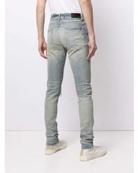 hellblaue enge Jeans mit Destroyed-Effekten von Amiri