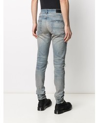 hellblaue enge Jeans mit Destroyed-Effekten von Amiri