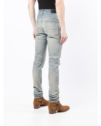 hellblaue enge Jeans mit Destroyed-Effekten von Amiri