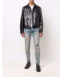 hellblaue enge Jeans mit Destroyed-Effekten von Amiri