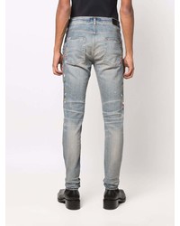 hellblaue enge Jeans mit Destroyed-Effekten von Amiri