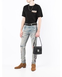 hellblaue enge Jeans mit Destroyed-Effekten von Amiri