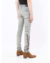 hellblaue enge Jeans mit Destroyed-Effekten von Amiri