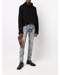 hellblaue enge Jeans mit Destroyed-Effekten von Amiri