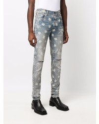 hellblaue enge Jeans mit Destroyed-Effekten von Amiri