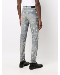 hellblaue enge Jeans mit Destroyed-Effekten von Amiri