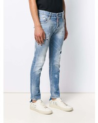 hellblaue enge Jeans mit Destroyed-Effekten von DSQUARED2