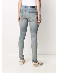 hellblaue enge Jeans mit Destroyed-Effekten von Amiri