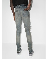 hellblaue enge Jeans mit Destroyed-Effekten von Amiri