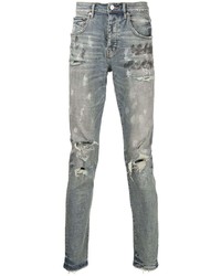 hellblaue enge Jeans mit Destroyed-Effekten von purple brand