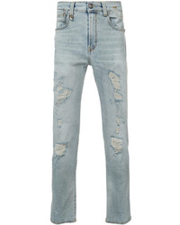 hellblaue enge Jeans mit Destroyed-Effekten von R 13