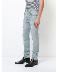 hellblaue enge Jeans mit Destroyed-Effekten von R 13