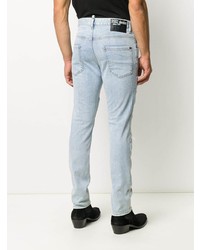 hellblaue enge Jeans mit Destroyed-Effekten von DSQUARED2