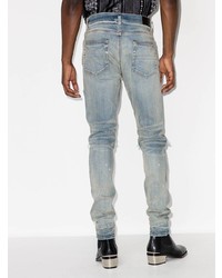 hellblaue enge Jeans mit Destroyed-Effekten von Amiri