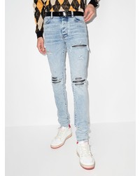 hellblaue enge Jeans mit Destroyed-Effekten von Amiri