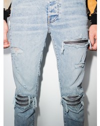 hellblaue enge Jeans mit Destroyed-Effekten von Amiri