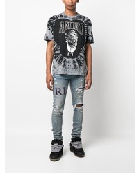 hellblaue enge Jeans mit Destroyed-Effekten von Amiri