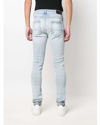 hellblaue enge Jeans mit Destroyed-Effekten von Amiri