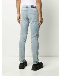 hellblaue enge Jeans mit Destroyed-Effekten von Balmain