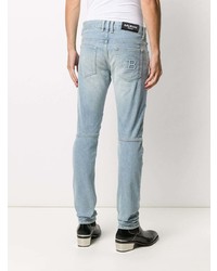 hellblaue enge Jeans mit Destroyed-Effekten von Balmain