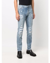 hellblaue enge Jeans mit Destroyed-Effekten von Balmain