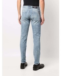 hellblaue enge Jeans mit Destroyed-Effekten von Balmain