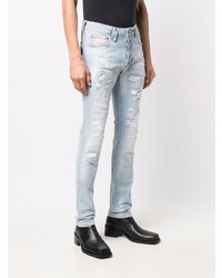 hellblaue enge Jeans mit Destroyed-Effekten von Philipp Plein