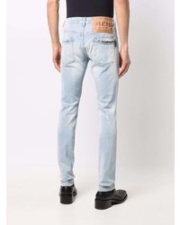 hellblaue enge Jeans mit Destroyed-Effekten von Philipp Plein