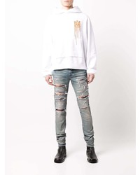 hellblaue enge Jeans mit Destroyed-Effekten von Amiri