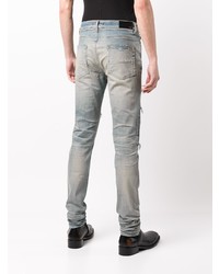 hellblaue enge Jeans mit Destroyed-Effekten von Amiri