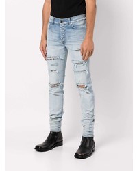 hellblaue enge Jeans mit Destroyed-Effekten von Amiri