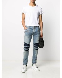 hellblaue enge Jeans mit Destroyed-Effekten von Balmain