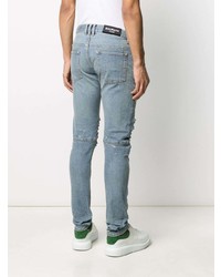 hellblaue enge Jeans mit Destroyed-Effekten von Balmain