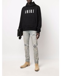 hellblaue enge Jeans mit Destroyed-Effekten von Amiri