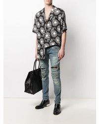 hellblaue enge Jeans mit Destroyed-Effekten von Balmain