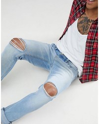 hellblaue enge Jeans mit Destroyed-Effekten von Rollas