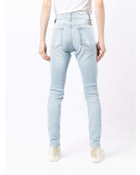 hellblaue enge Jeans mit Destroyed-Effekten von 7 For All Mankind