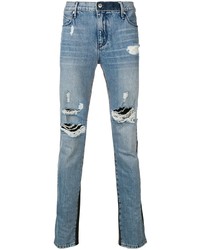 hellblaue enge Jeans mit Destroyed-Effekten von RtA